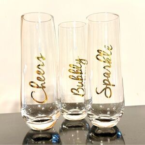 Stemless Champagne Flutes Glasses with Gold writing “Bubbly” “Cheers” “Sparkle”
